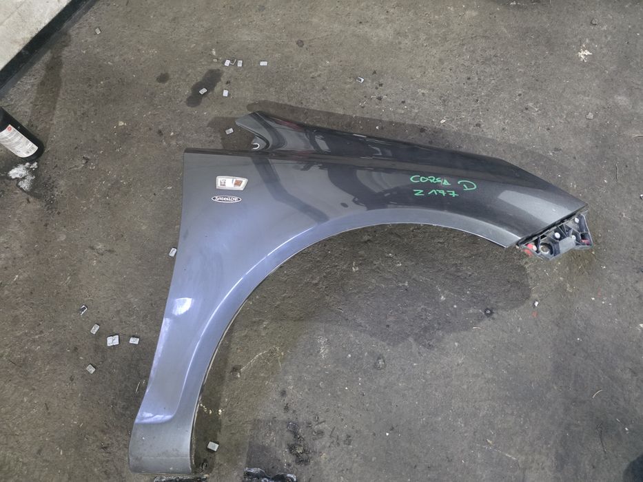 Corsa D Błotnik przód z177
