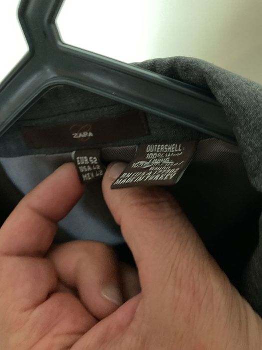 Foto de homem em cinza em ótimo estado