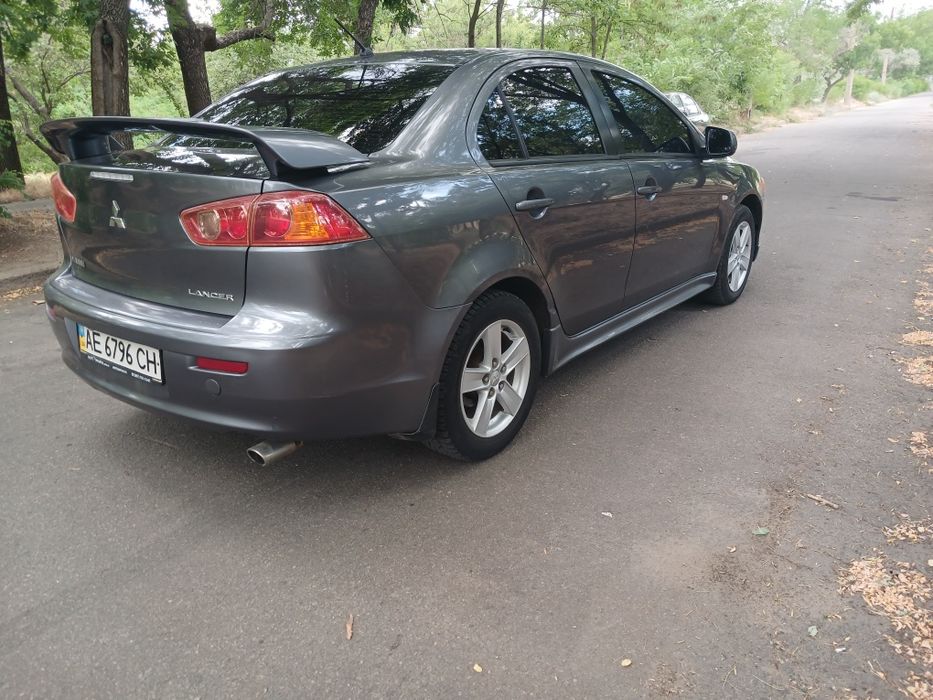 Продам lancer 2.0 акпп газ /бензин