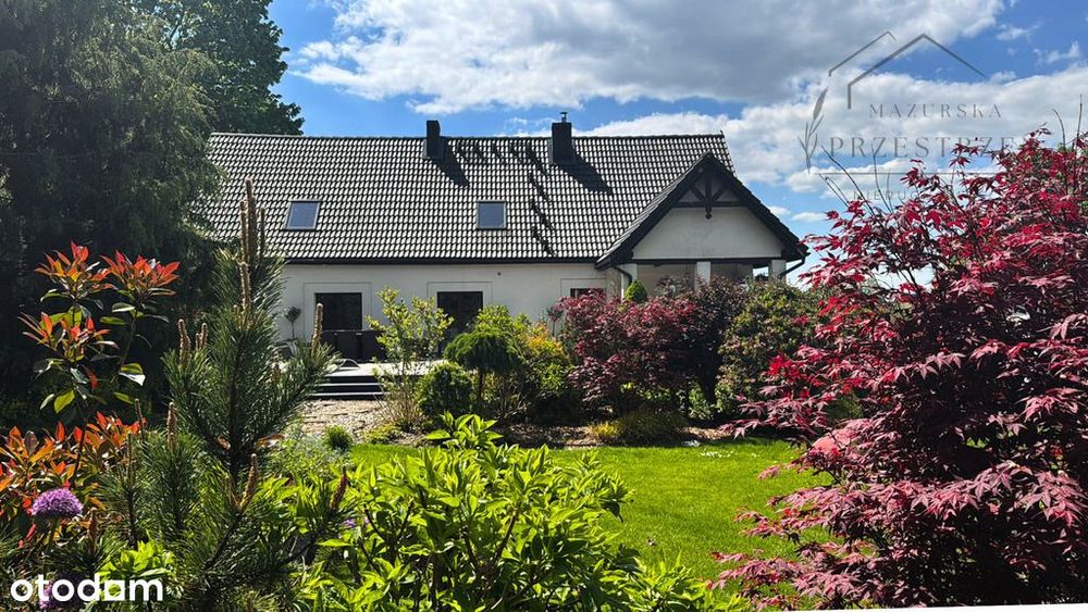 Dom na Mazurach blisko jeziora z pięknym ogrodem