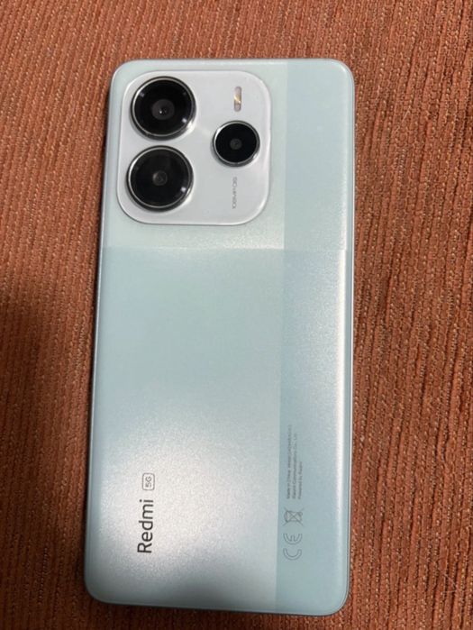 Smartphone Xiaomi Redmi Note 14 5G em tom verde