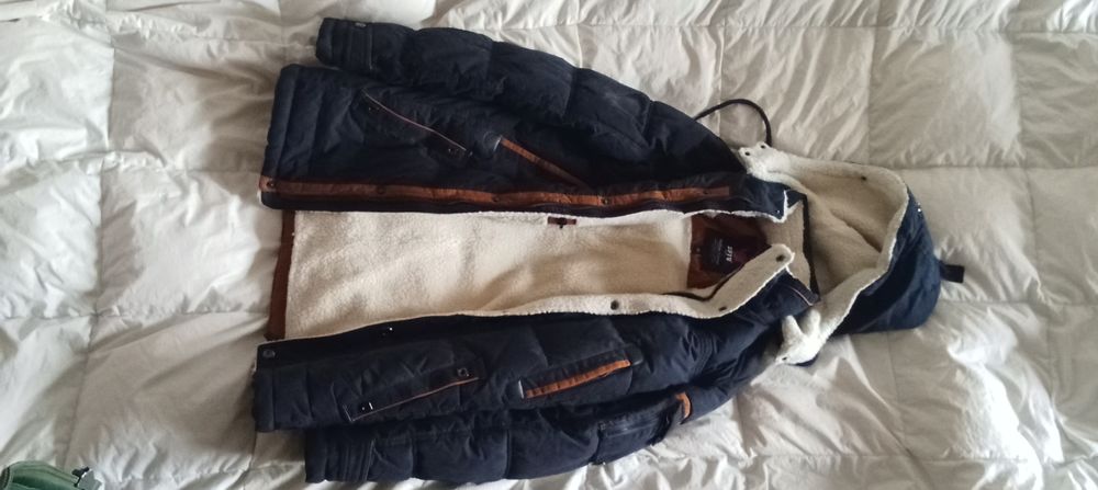 Зимова тепла дуже класна стан нової курточка 42-44 розмір пуховик