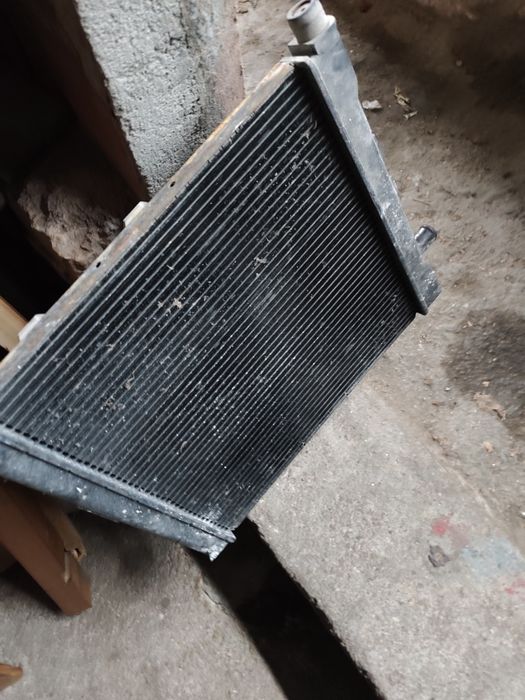 Radiador com ventoinha golf 4