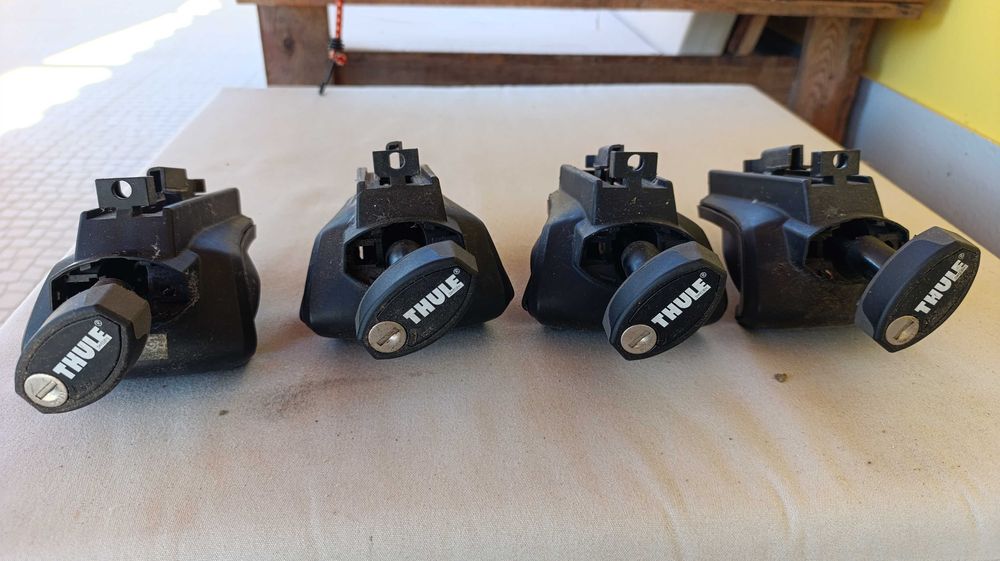 Suporte Thule para veículos com barras longitudinais