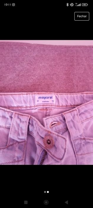 Calça ganga com rasgos