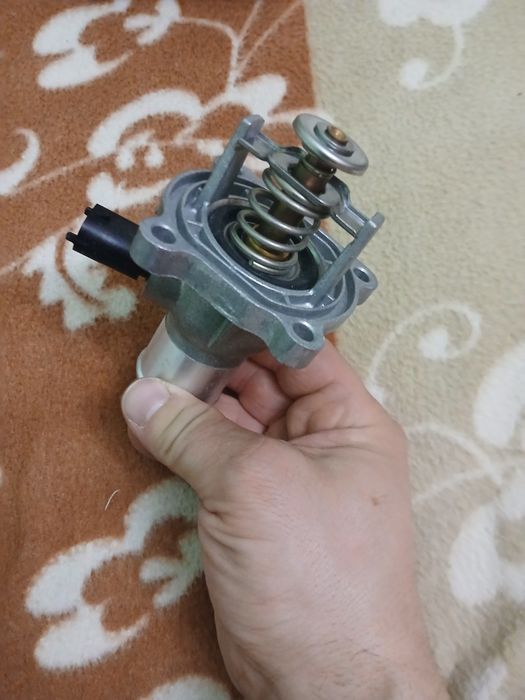 Termostat Opel Astra 3H 1,6.
