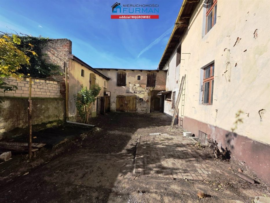 Dom jednorodzinny z budynkami gospodarczymi ŁEKNO