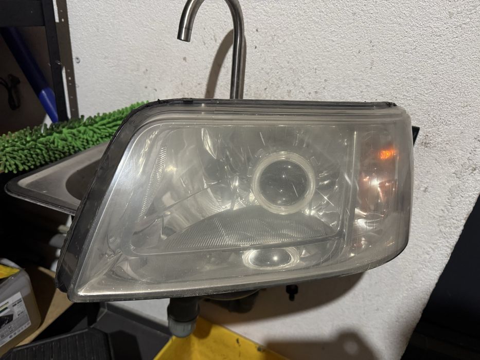 Фара ліва Volkswagen Transporter T5 7H1 941 015 S оригінал