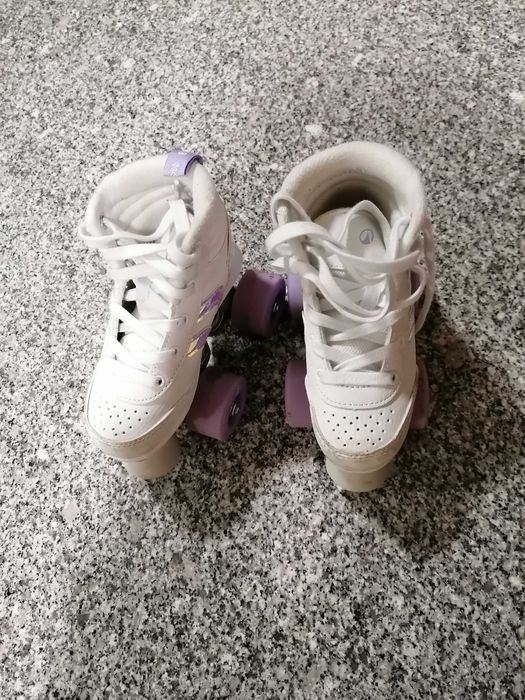 Patins 4 rodas e travões semi novos ( talao de compra de 18/12/25)