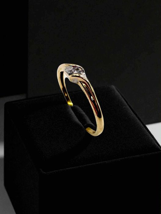 Złoty pierścionek z brylantem 585 /1,26