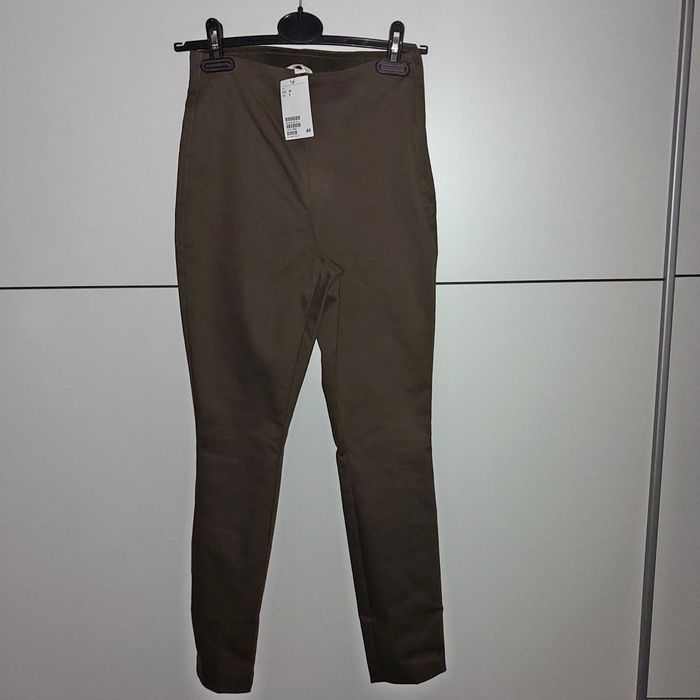 H&M nowe spodnie super stretch khaki r. 36