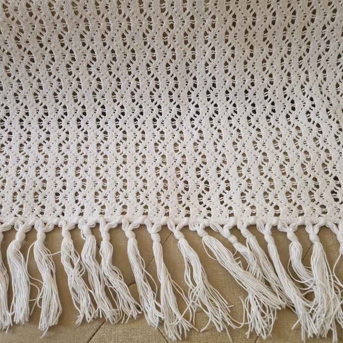 Colcha de renda feita à mão.