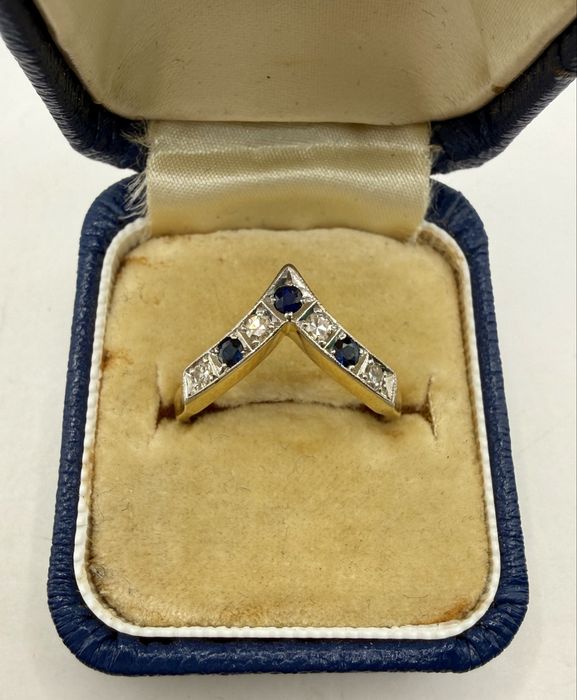 Złoty pierścionek 750 z szafirami 0,15ct i diamentami 0,15ct