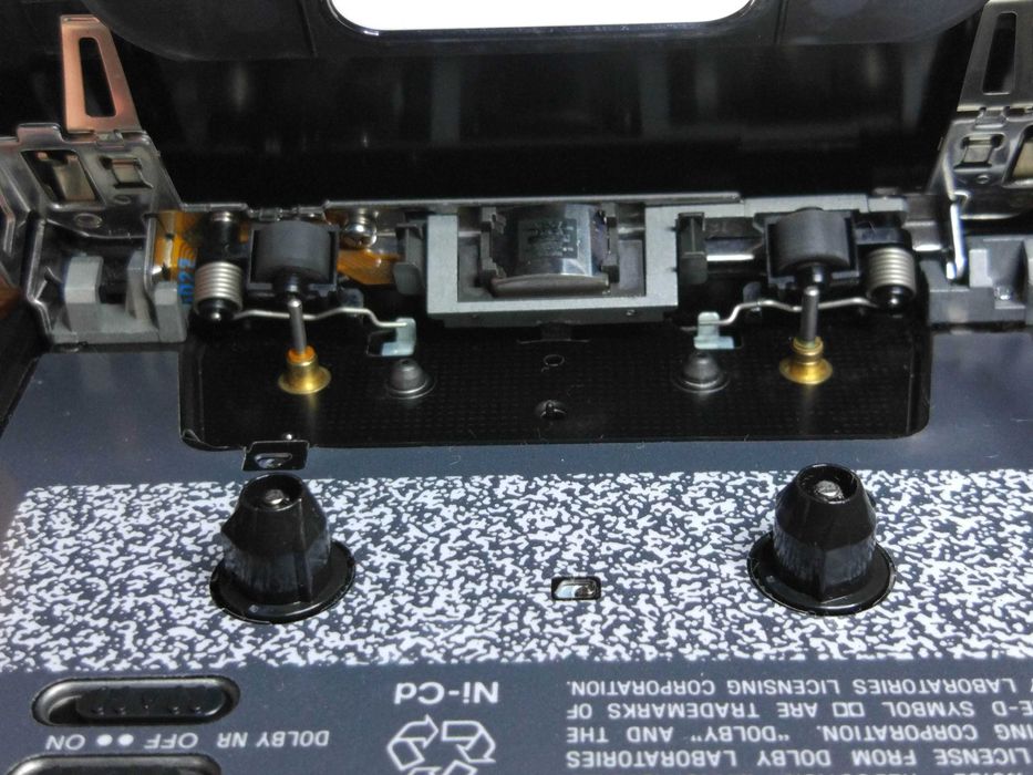 Walkman Sony WM-EX511 ze pilotem, słuchawkami i adapterem baterii