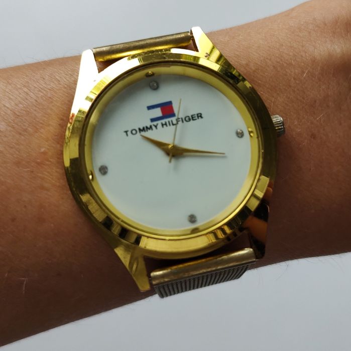 Zegarek th złoty Tommy damski złoty logowany używany bransoletka