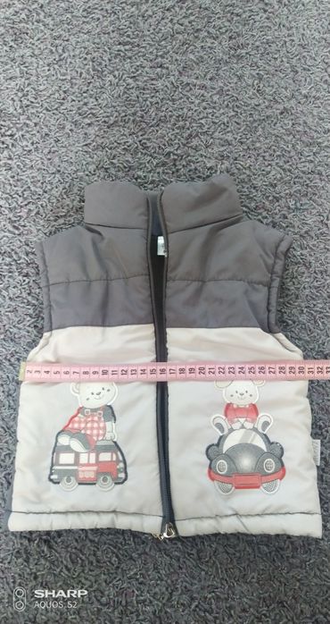 Продам детскую утепленную жилетку