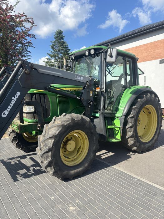 John deere 6320 z ladowaczem quicke