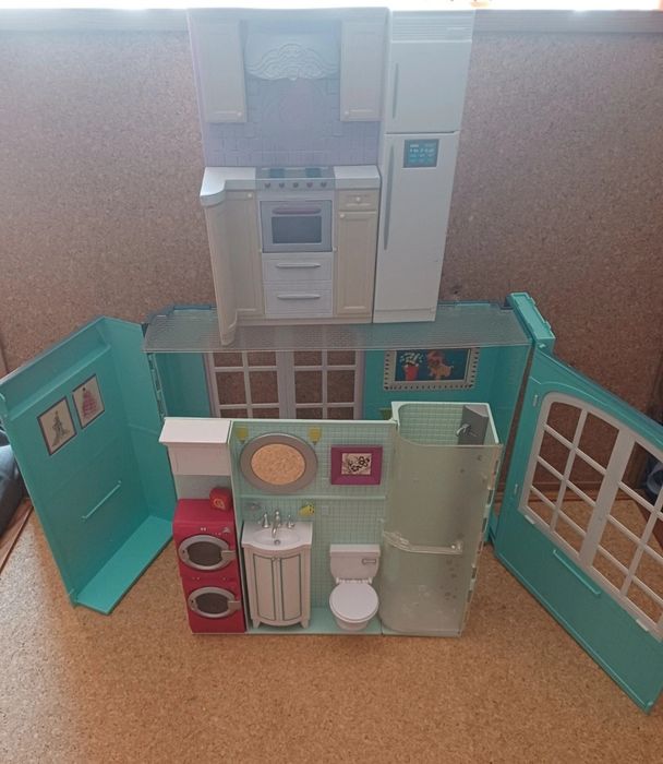 Barbie casa dobrável. 
Mattel.
Anos 2007.