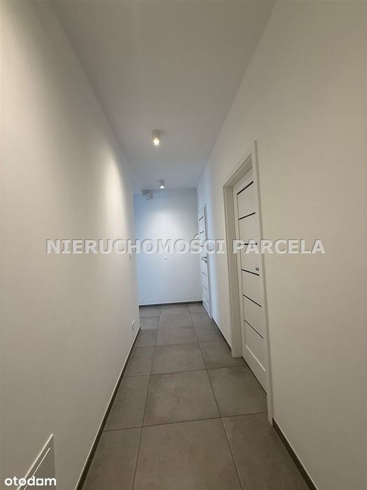 Mieszkanie w apartamentowcu z ogródkiem