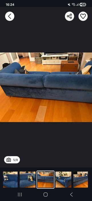 Sofa azul com pouco uso.