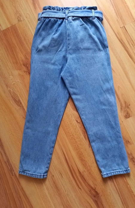Spodnie jeansy na dziewczynke 134/140