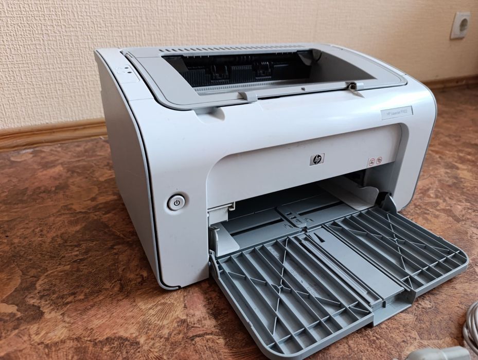 Принтер HP P1102