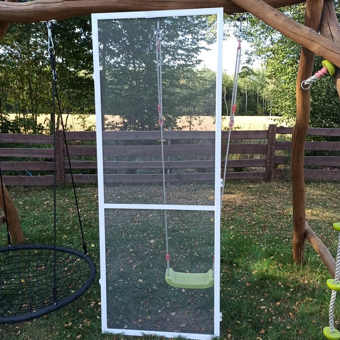 Moskitiera drzwiowa balkonowa na drzwi złożona biała