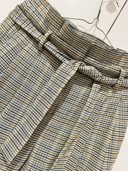 Materialowe spodnie Reserved 38