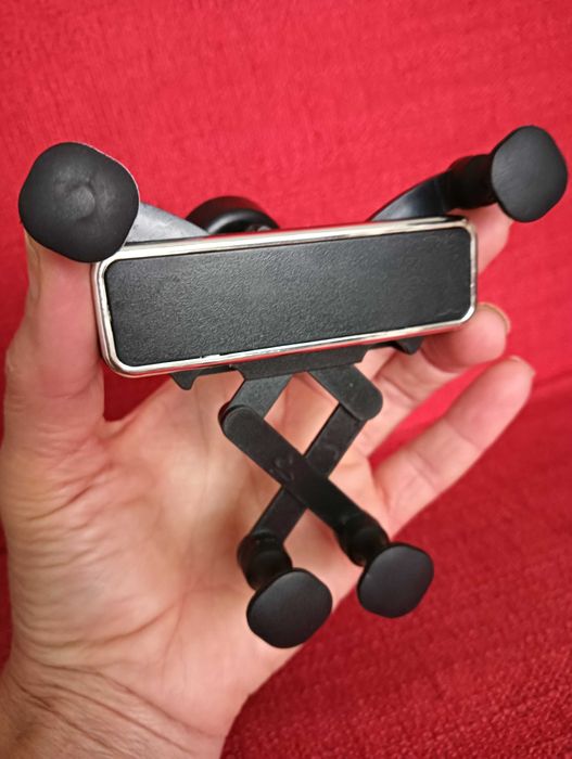 Suporte manual ajustável de telemóvel para viatura