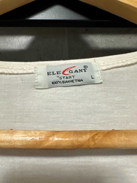 Koszulka bluzka z krótkim rękawem i ozdobą Ele Gant L