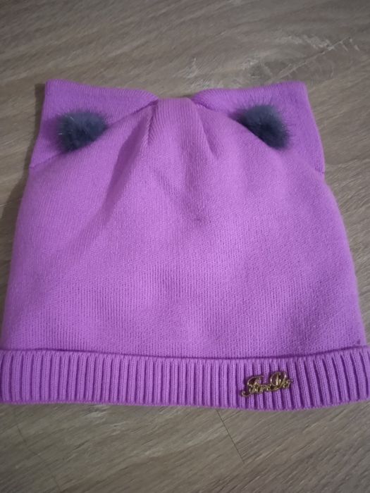Трикотажна шапочка з флісом на дівчинку 6-7 років.