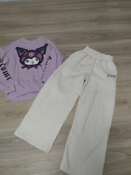 Величезний пакет  одягу на жінку.