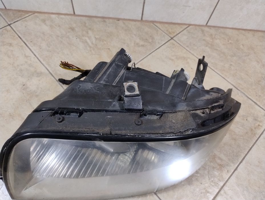 Audi a2 reflektor lampa lewa przód Europa oryginał wysyłka OLX