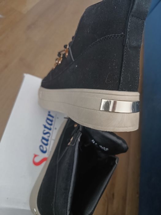 Buty na wyższej podeszwie seastar
