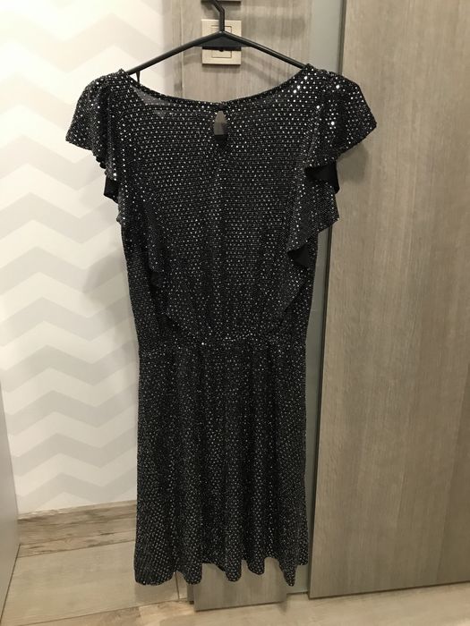 Elegancka sukienka dla dziewczynki Smyk 152
