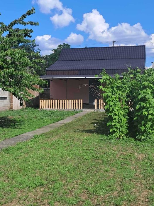 Продам дом с участком 8 сот. Новый евроремонт. Проспект Металлургов. Гараж.