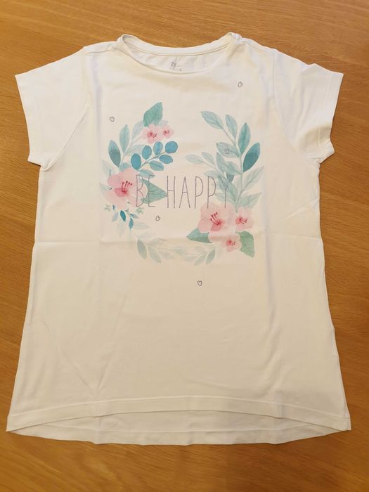 T-shirt branca com flores e "Be Happy" em prateado da Zippy 13/14 anos