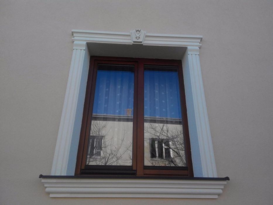 Фасадний декор.Ліпнина на фасад.Утеплення фасаду.Карнизи.Багети.Колони