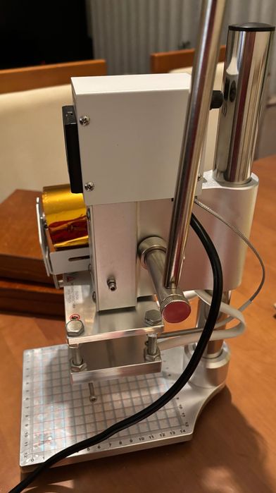 Máquina de gravação a quente