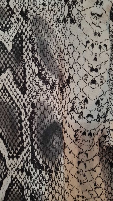 Top de mulher padrão reptil