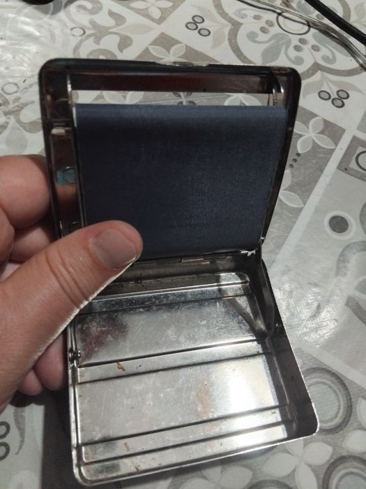 Máquina para enrolar cigarros