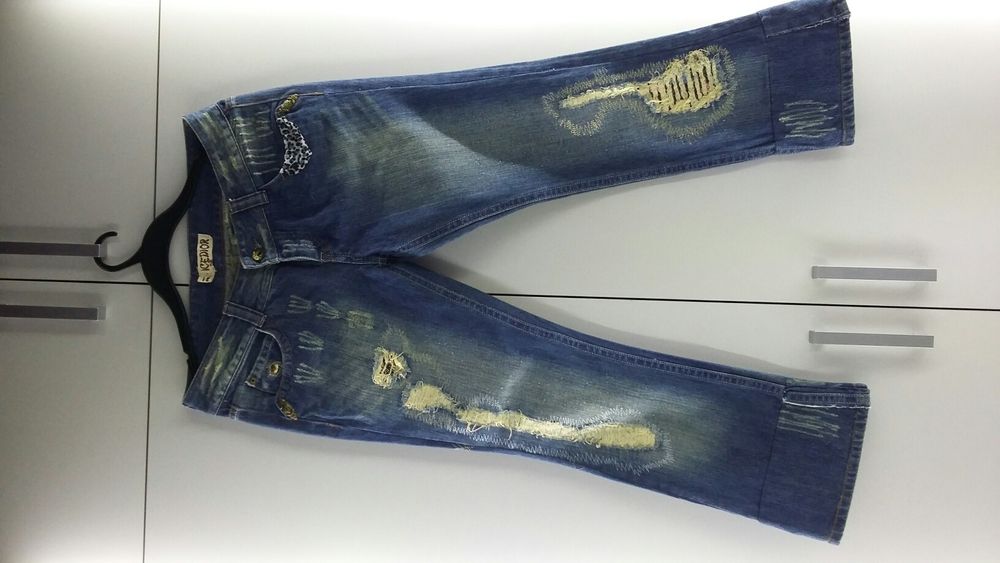 Jeansy damskie przecierane Icedior 31