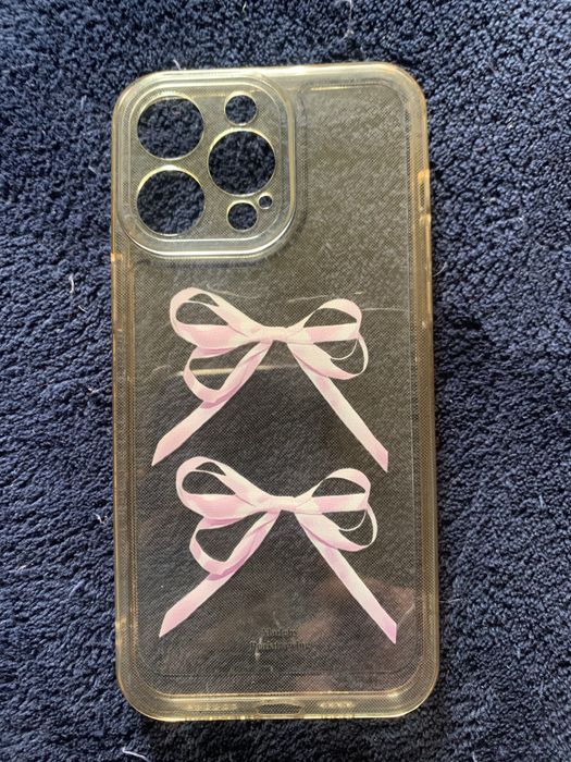 прозорий чохол для iPhone 12 Pro з рожевими бантиками.