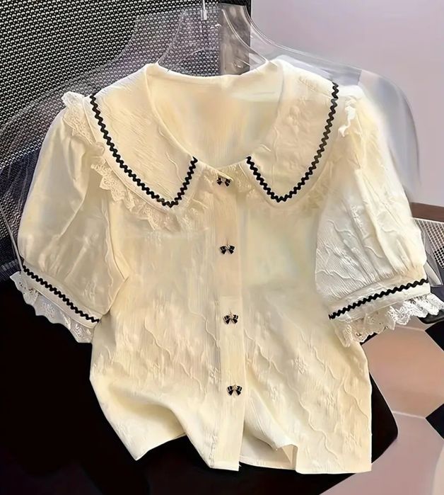 Жіноча елегантна біла блуза