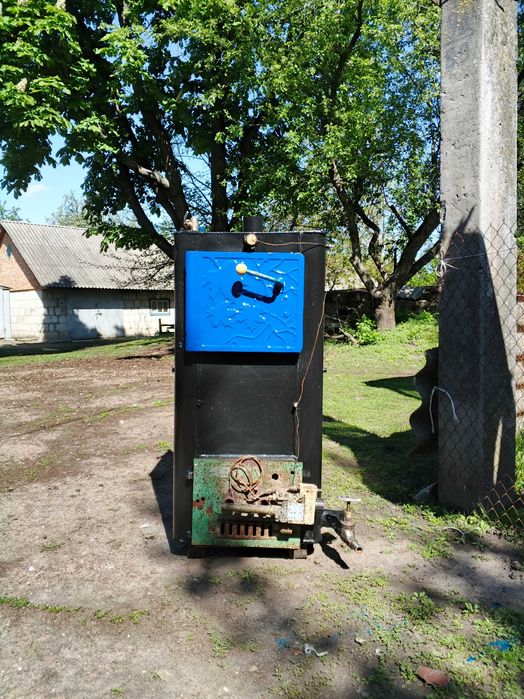 Продам котел Газовий, з можливістю опалення дровами