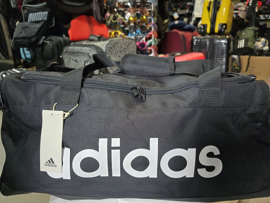 Спортивна сумка adidas Essentials Logo Medium
Спортивна сумка для поїз