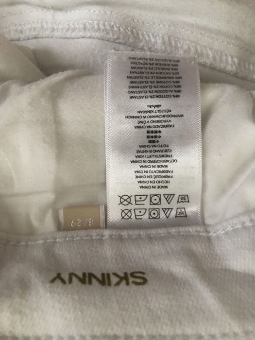 Białe spodnie jeansowe damskie Michael Kors 8/29