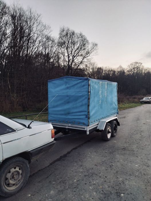 До вашої уваги бортовий 2-х осний причеп