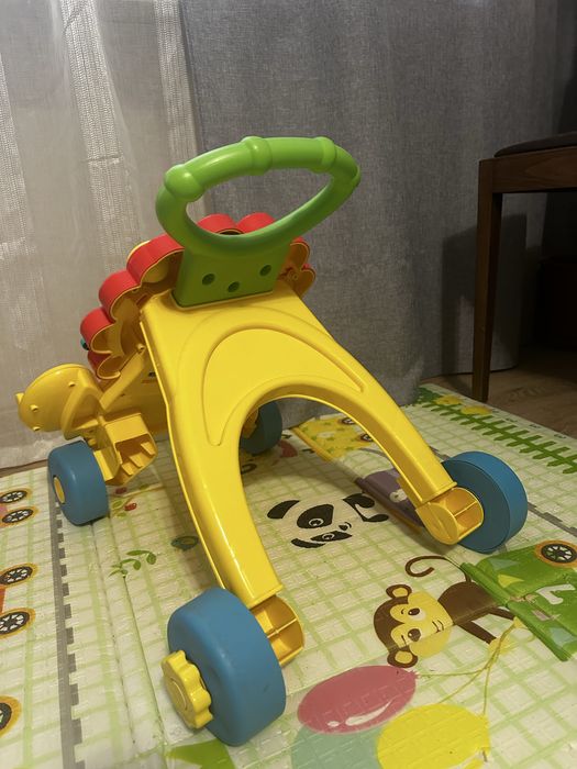 Іграшка Fisher-Price Ходунки - штовхач музичний