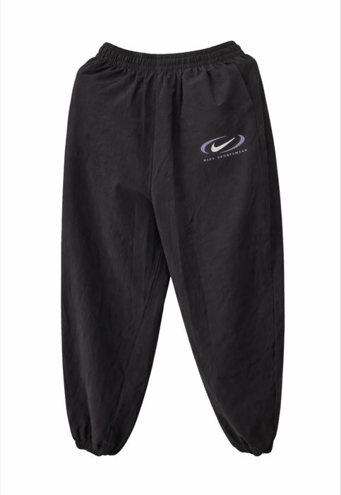 Нейлонові штани Nike